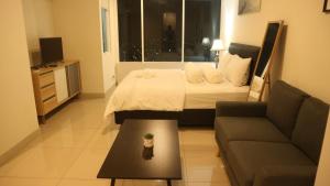 Apartemen Grand Kamala Lagoon by Cheapinn