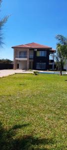 Executive 4 bedroom house with 4 beds .