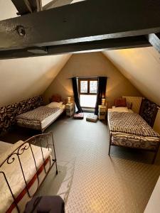 Maisons de vacances L'ecole du Hameau 9pers Le Mont Dore : photos des chambres