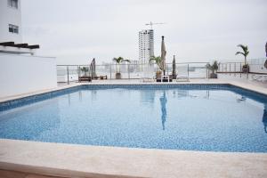 TORRE ALBA 507 Condo a una cuadra del malecon
