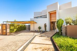 Amelkis, villa luxe front golf