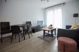 Appartements Appartement adorable et jardin : photos des chambres