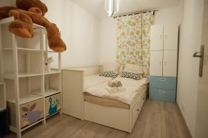 Appartements Appartement adorable et jardin : photos des chambres