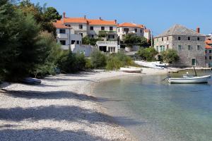 Apartments by the sea Postira, Brac - 22158