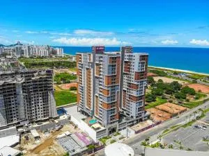 Ap novo em frente a shopping center e próximo a praia - Jucu