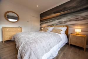 Luxury 4 bed beachside home with coastal views