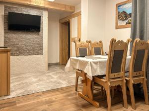 Apartamenty i pokoje Gościniec na Równi