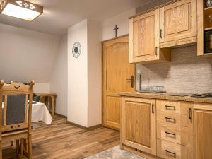 Apartamenty i pokoje Gościniec na Równi