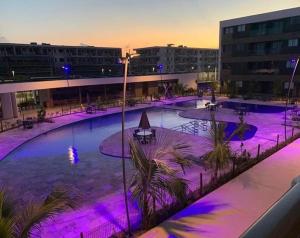 Flat com vista para piscina principal