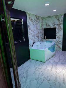 Maisons de vacances Maison Appartement Triplex avec jacuzzi et sauna : photos des chambres