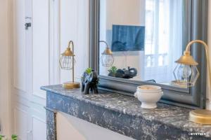 Appartements Le Baldaquin quartier cathedrale-marais : photos des chambres
