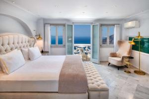 Royal Suite with Outdoor Hot Tub and Caldera View room in Athina Luxury Suites