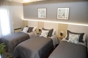 Grupo Arcanos Pensión Atenea & Via Romana - Cuntis