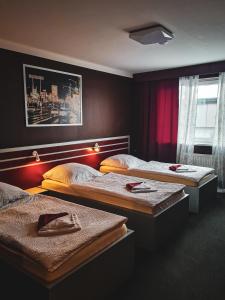 Triple Room with Shared Bathroom room in Hotel 108