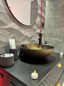 Appartements Suite romantique avec jacuzzi et sauna : photos des chambres