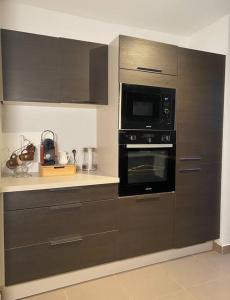 Appartements The place to B&B - vue lac, 3 chambres et parking prive : photos des chambres