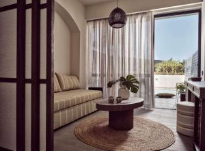 Evergreen One-Bedroom King Suite with Pool room in NUMO Ierapetra Beach Resort