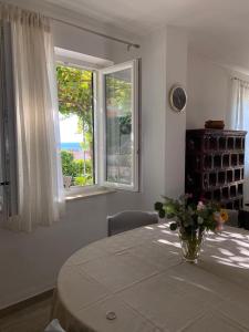 Apartments by the sea Postira, Brac - 22160