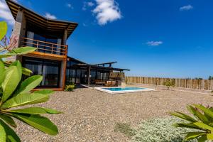 Casa Macondo - Casa de playa en Vichayito by WiroHouse
