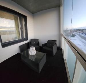 Kompakti kolmio saunalla, Kalajoen keskustassa