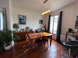 Appartements Charmant appartement familial avec jardin : photos des chambres