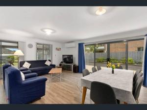 Cheerful 3 Bedroom House with cozy wood fire.