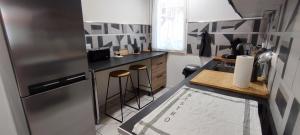 Appartements Chaleureux - Bien equipe - Hypercentre - 2Ch 6pers : photos des chambres
