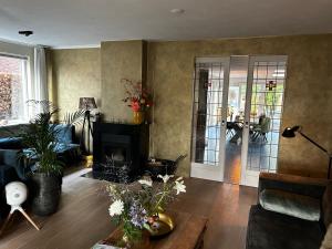 Woning met vijver, oase van rust...
