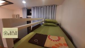 Condo in McKinley Hill near Grand Canal Mall (Balai Bellini)