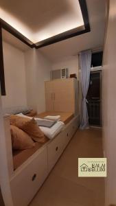 Condo in McKinley Hill near Grand Canal Mall (Balai Bellini)