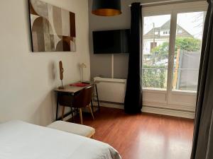 Appartements Appart Proche Disneyland et Paris : photos des chambres