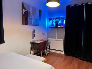 Appartements Appart Proche Disneyland et Paris : photos des chambres