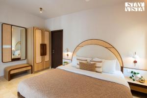 Sunlit Splendour by StayVista near Nagaon beach boasting an Outdoor pool and Modern chic interiors