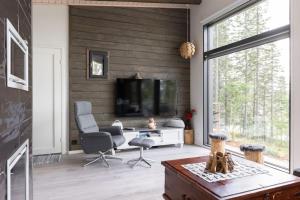 Holiday home with outdoor Jacuzzi and Sauna