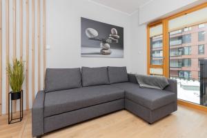 Modern White Apartments in Gdańsk with Balcony and Access to Gym by Renters