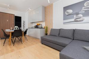 Modern White Apartments in Gdańsk with Balcony and Access to Gym by Renters