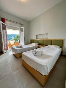 Family Room with Sea View room in Kavos Hotel