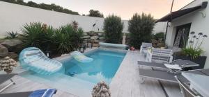 Maisons de vacances Maison agreable et paisible : photos des chambres