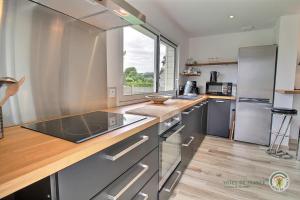 Maisons de vacances La maison du golf : photos des chambres