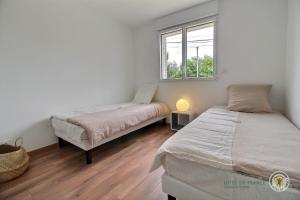 Maisons de vacances La maison du golf : photos des chambres