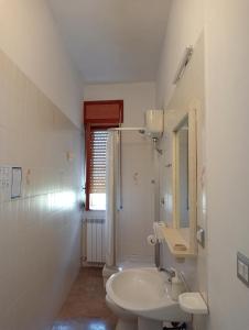 One-Bedroom Apartment and Sea View room in Residenza Giancesare