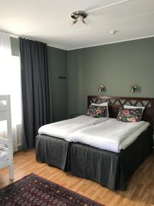 Quadruple Room with Shared Bathroom room in Vandrarhemmet Östergatan