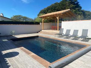 Villas magnifique villa a 50 m de la plage : photos des chambres