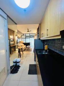 Aizas Place in Shell Residences MOA