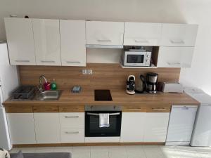 Appartements COEUR DE CALVI : photos des chambres