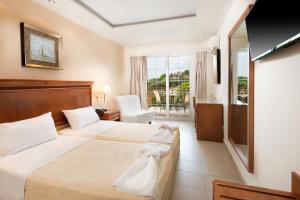 Family Suite room in Avalon Palace Hotel