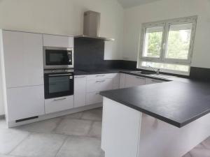 Ravissante suite avec terrasse, parking sur place