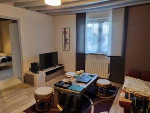 Appartements Saint Quentin en Yvelines- Montigny le Bretonneux village, avec jardin,10min des sites olympiques de golf et de velo, 15 minutes de Versailles 30 minutes de Paris Host fluent in English : photos des chambres