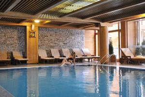 Stylish wooden apartment with terrace in Pirin Golf Hotel&Spa Complex