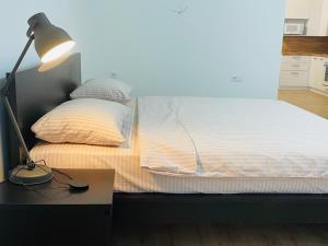 На Куліша 3, сучасні апартаменти біля оперного